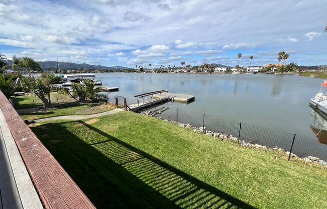 WATERFRONT HOME IN BEL MARIN KEYS WITH BOAT DOCK, FENCED YARD.