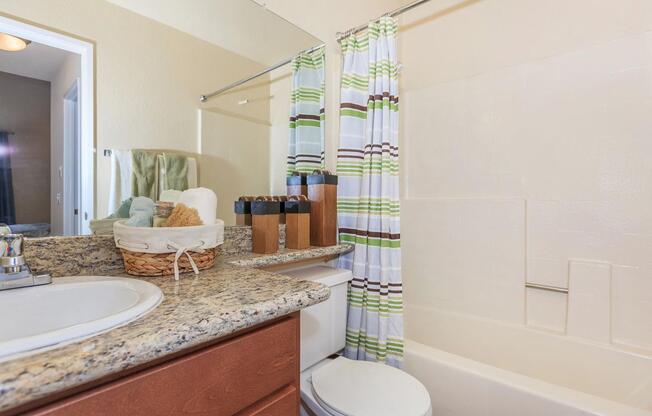 a kitchen with a sink and a mirror