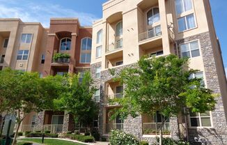 The property features neutral colors and laminate flooring throughout.