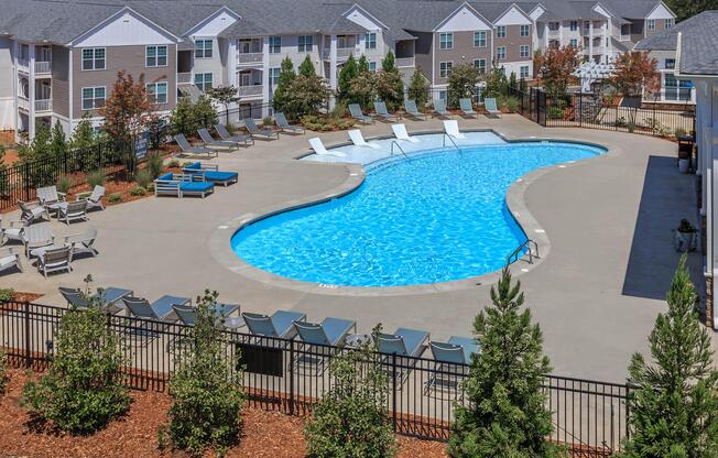 Cool Down By The Pool At Riverstone Apartments At Long Shoals In Arden, NC