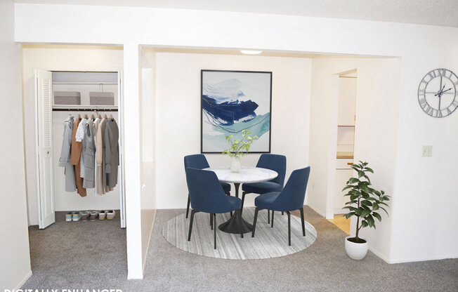 Dining room with an entry door to a closet at Seville Apartments in Kalamazoo, MI 49009