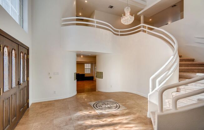 BEAUTIFUL 4 bedroom home with 2 Primary bedrooms in Canyon Gate Golf Course Community!