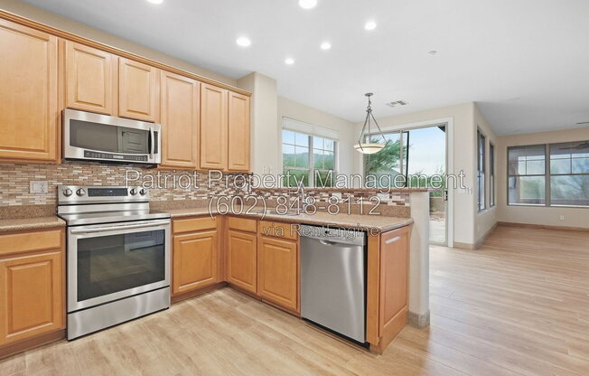 11599 E RAINTREE DR