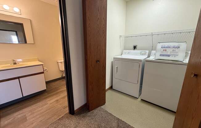A laundry room with a washer and dryer.