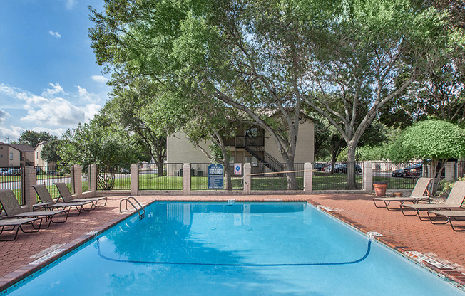 Pool and lounge chairs l Georgetown Park Apartments for rent in TX