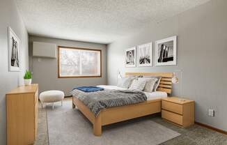 a bedroom with a bed and a dresser