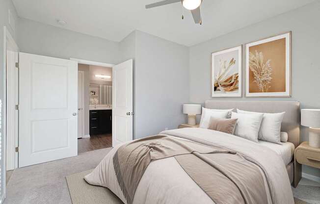 A room with a ceiling fan and carpeted floor.