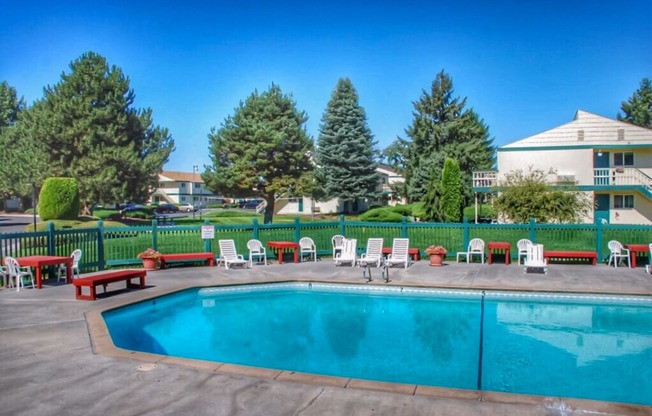 La Verde Apartments Pool Area with Lounge Chairs