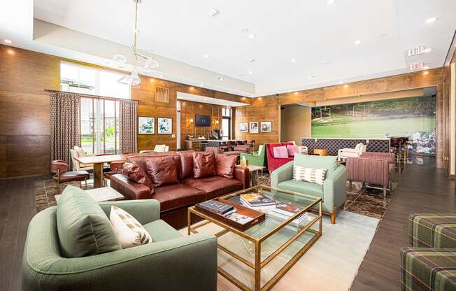 a living room with couches and chairs and a table