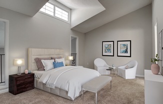 Bedroom at Mirador at Idlewood in Clarkston, Georgia, with ample natural light and a cozy, inviting atmosphere.