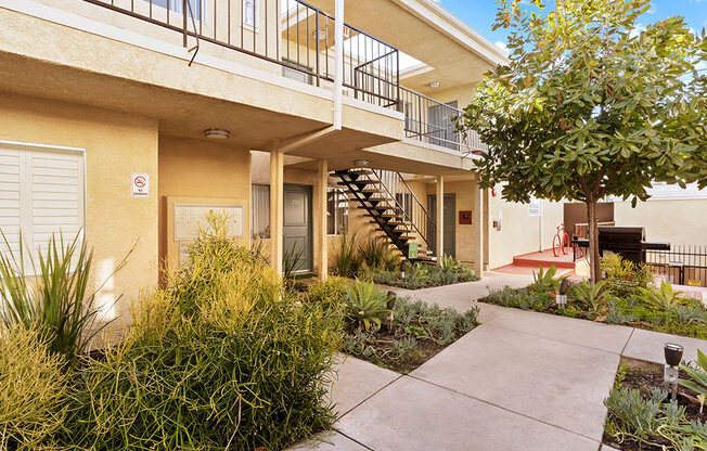 Drought resistant landscaping and barbeques in each courtyard.