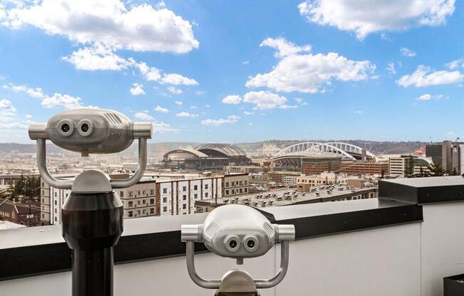 a pair of surveillance cameras on a roof