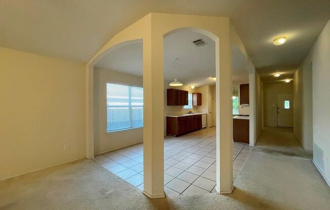 126 Salado Dr in Kyle is a charming single-story brick home nestled in the Silverado at Plum Creek community!