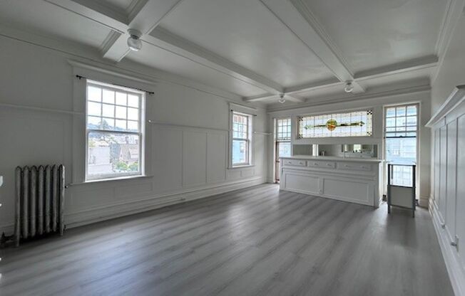 Spacious, Studio, One Bath Unit, with upgraded floors, above commercial shops