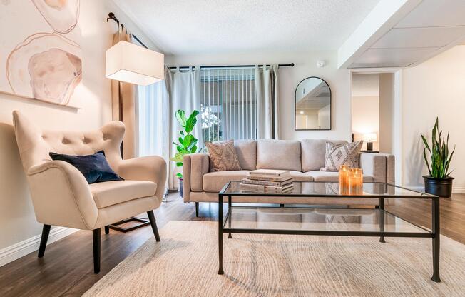 a living room filled with furniture and a fire place