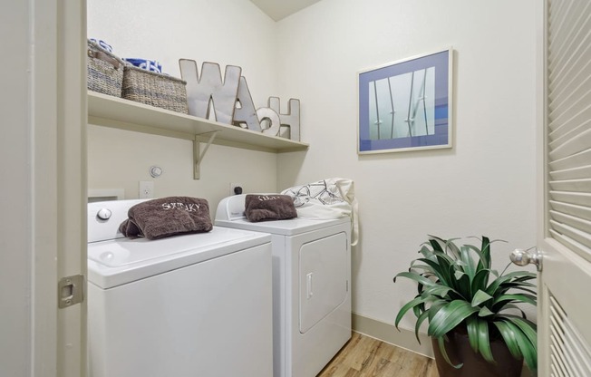 a washer and dryer in a laundry room at Alvista Round Rock, Round Rock, 78664