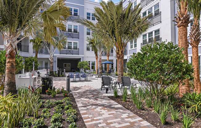 Outdoor garden courtyard at The Foundry Luxury Apartments in Tampa FL