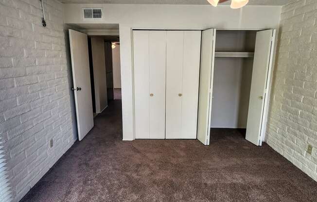 2x2 Upstairs Classic Guest Bedroom with Closets at Mission Palms Apartment Homes in Tucson AZ