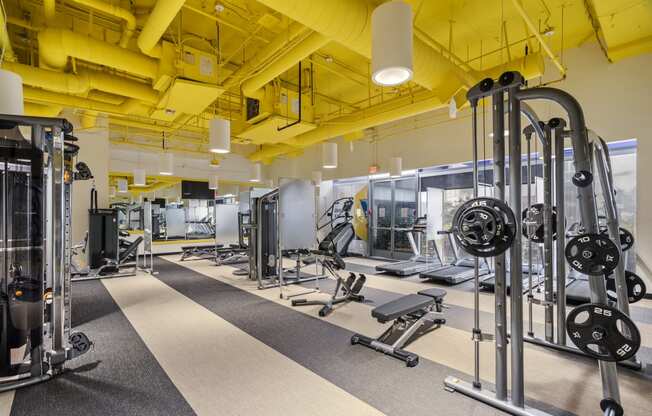 Gym with cardio and weights at Wilshire Vermont, Los Angeles