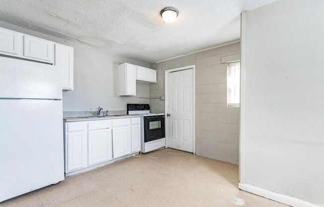 Updated 2-Bed, 1-Bath Townhouse Just Minutes from Downtown Raleigh