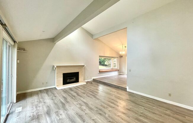 Spacious Tri-Level Home in West Lake Sammamish with Luxurious Features and Prime Location