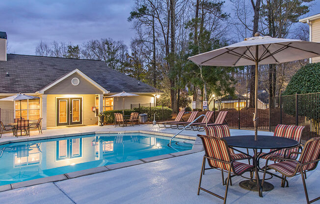 Enjoy Our Pool Deck with Patio and Chairs at Addison on Cobblestone, Fayetteville, 30215