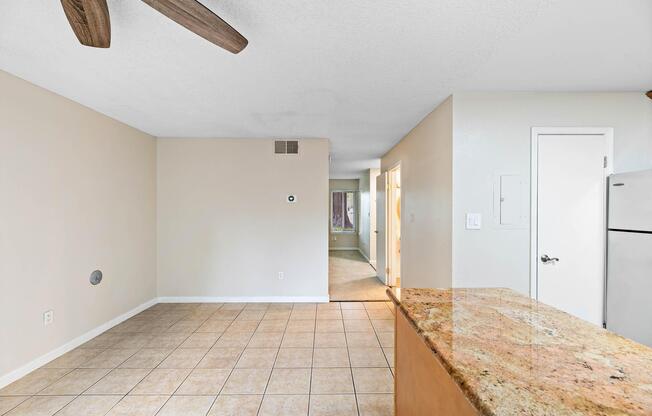 a kitchen with a wooden floor