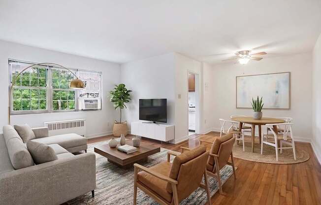 Living room, dining area and kitchen (virtually staged) at Mason Hall in Alexandria, VA 22314