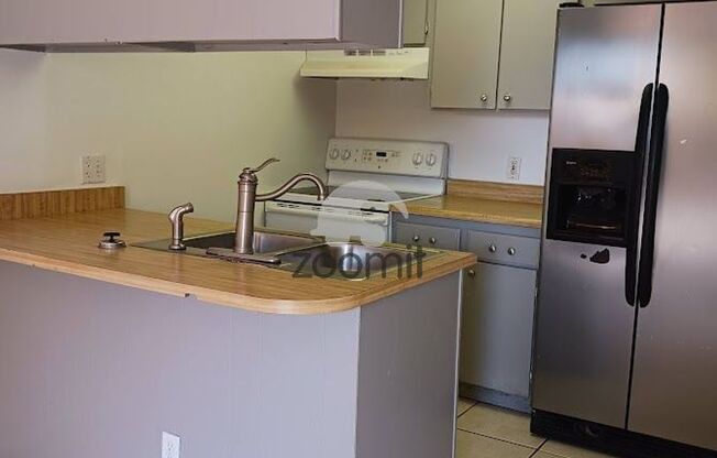 Charming Two-Level Townhome – Freshly Updated and Move-In Ready!