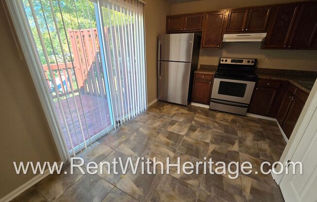 WOW!!! GORGEOUS DUPLEX / GREAT ROOMMATE FLOORPLAN / UPGRADES / GREAT LOCATION / PRIVATE YARD