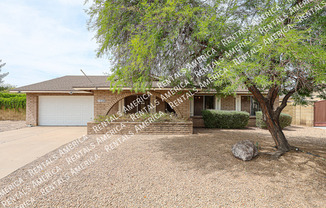 1028 E PARADISE LN