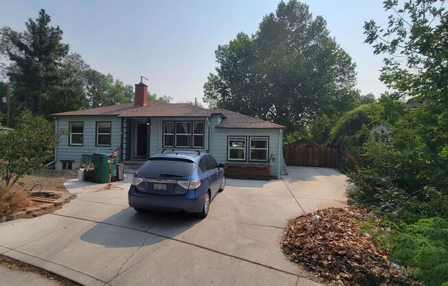 CLOSE TO UNR - HARD WOOD FLOORS - LARGE BACKYARD - EXTRA STORAGE