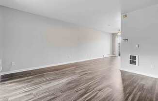 Apartments for Rent San Jose CA - Los Gatos Creek - Living Room with Wood-Style Flooring and Light Grey Walls