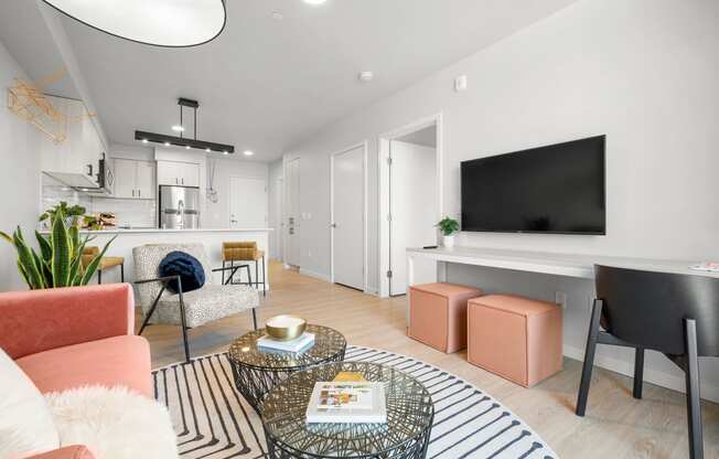 a living room with white walls and hardwood floors at Ion Town Center, Shoreline, WA 98133