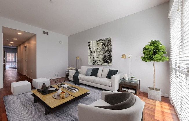 a living room with two couches and a coffee table