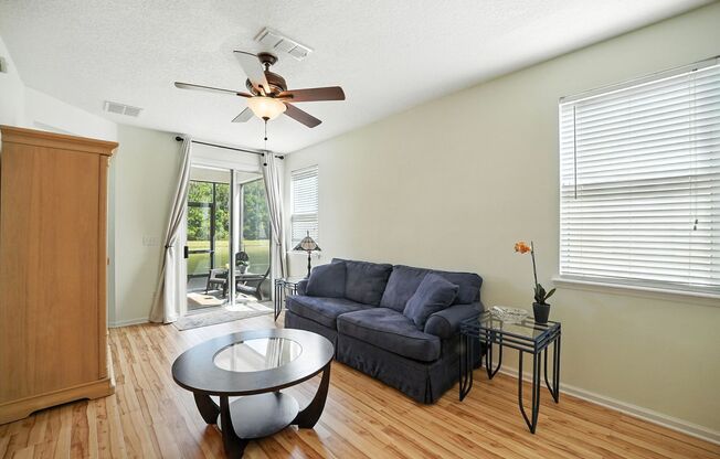 Immaculate three-bedroom, three-bath end-unit townhome showcasing upgrades throughout.