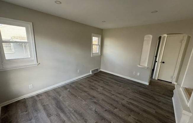 2 bed 1 bath recently refinished corner home with new kitchen, bathroom, and floors!