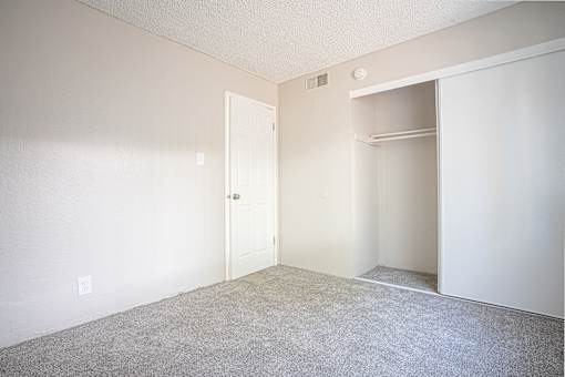 Carpeted Bedroom at Parkside Gardens Apartments, Nevada  