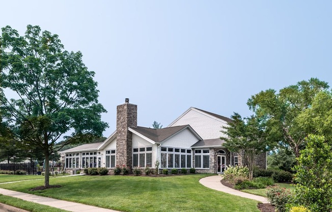 a large lawn in front of a house at Misty Ridge Apartments, Woodbridge, 22191