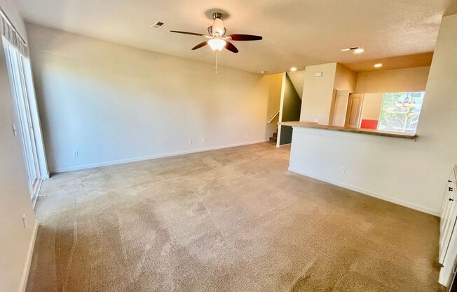 $500 RENT CREDIT! Two Bedroom Townhome with 2 Car Garage, A/C & Private Patio