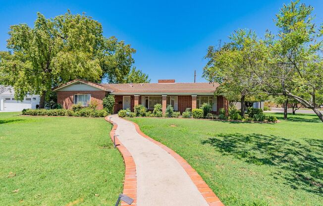 Classic Red Brick Beauty in Prestigious North Central Park