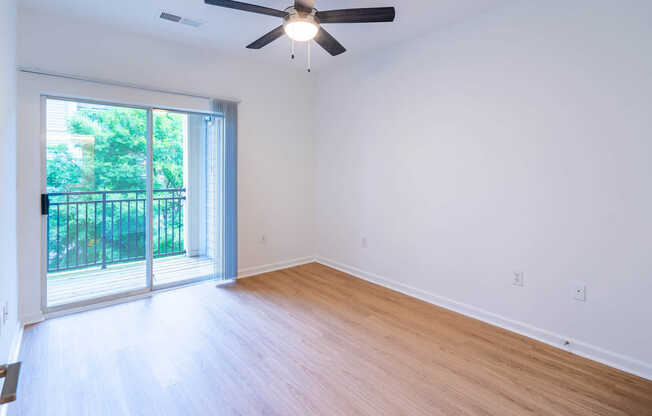 Bedroom with Balcony and Hard Surface Flooring