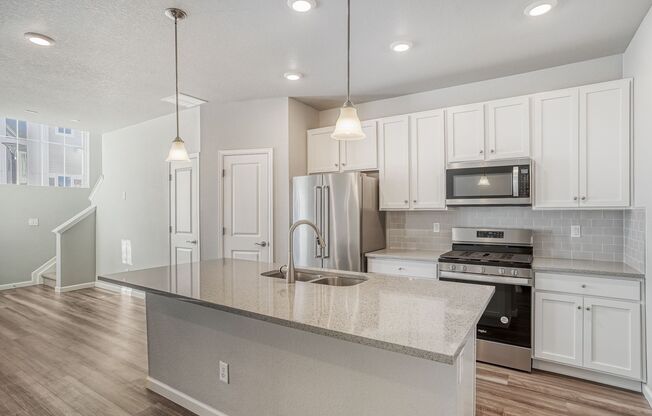 Evolve Real Estate: Spacious 3 Bed 2.5 bath Townhouse with Attached 2 Car Garage AVAILABLE NOW!