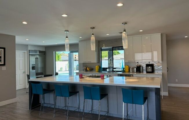 Amazing remodeled home in the Sands Scottsdale!!!  4 bedroom with a den remodeled yard and so much more!!!  Available June 1st!!  Gourmet kitchen with Huge island and all appliances!!!  This is a Stunner!!!