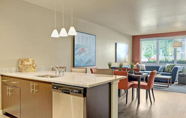 A kitchen with a dining table and chairs. at Kirkland Crossing Apartments, Kirkland, WA