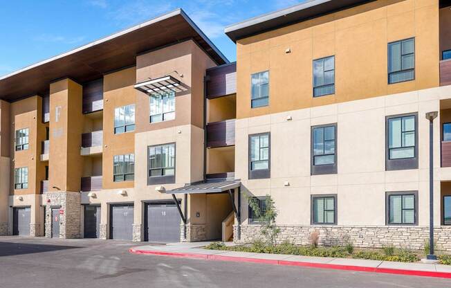 A large apartment complex with multiple buildings and balconies.
