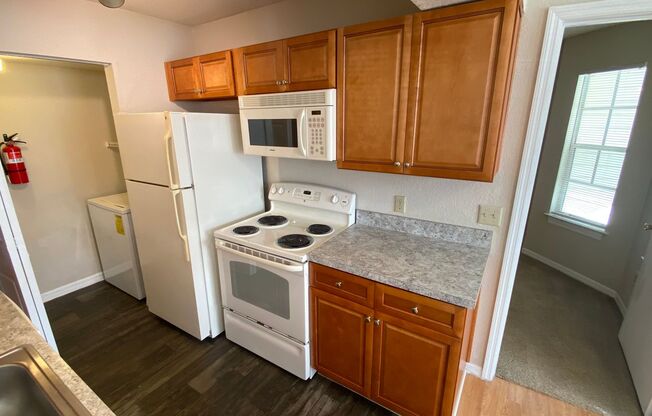 2br/2ba Tradewinds Condo with Wood Floors & W/D!