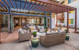 Aurora Apartments outdoor seating area with canopy