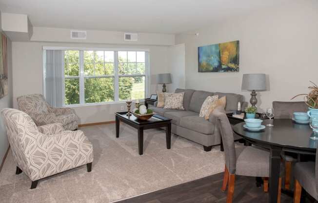 spacious living room with large window