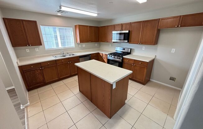 Spacious Tri-Level 4-Bedroom Home with Balcony and Community Amenities in Northwest Las Vegas!